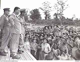 LAE, NEW GUINEA, 1946-01-28. DURING AN INSPECTION TOUR OF AUSTRALIAN UNITS IN THE LAE AREA, THE HONOURABLE F. M. FORDE, MINISTER FOR THE ARMY, ADDRESSED SERVICE PERSONNEL AT THE OTHER RANKS' CLUB. ..