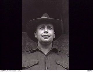 BISIATABU, NEW GUINEA. 1943-10-26. NX2043 SERGEANT W. WALL OF THE 2/4TH AUSTRALIAN INFANTRY BATTALION WHO IS TRANSFERRING TO THE 1ST PAPUAN INFANTRY BATTALION, AS A SECTION OR PATROL LEADER