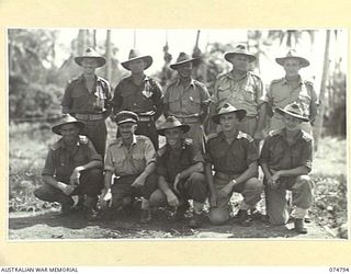 Officers of the 165th General Transport Company. Identified, left to right, back row: Mr Clucas, YMCA representative, NX107368 Captain (Capt) John Herbert McClafferty, NX13657 Capt William Richard ..