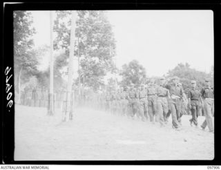 RABAUL, NEW BRITAIN. 1945-10-10. A SPECIAL PARADE AND CONCERT WAS HELD AT THE CAMP TO CELEBRATE THE 34TH ANNIVERSARY OF THE FOUNDING OF THE CHINESE REPUBLIC. MAJOR GENERAL K.W. EATHER, GENERAL ..