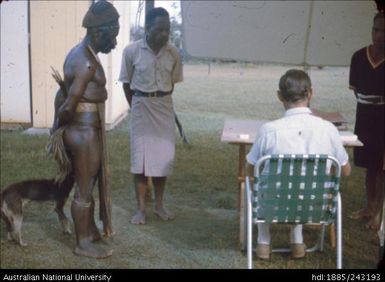 Man collecting ballot paper