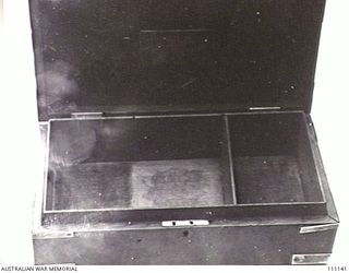 MELBOURNE, VIC. 1945-07-17. THE INSIDE OF A CIGARETTE BOX WITH SOLID SILVER FITTINGS AND AN ARTILLERY COAT OF ARMS ON THE LID. THE BOX WAS PRESENTED TO OFFICERS OF THE 4TH REGIMENT OF HEAVY ..