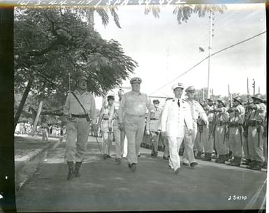 The Governor of New Caledonia, Together With US, New Zealand and French Officers, Inspects the Native Soldiers of the Free French Garrison in New Caledonia, Prior to Parade in Honor of Returned FF Volunteers of the African Campaign