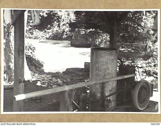 17 MILE, LALOKI RIVER, NEW GUINEA. 1943-11-22. AT THE BEGINNING OF 1943-05, A CORDIAL FACTORY WAS ESTABLISHED AT SAPPHIRE BY THE AUSTRALIAN DEFENCE CANTEEN SERVICES ATTACHED TO HEADQUARTERS, NEW ..