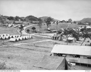 PORT MORESBY, NEW GUINEA. 1944-05-31. THE NEW GUINEA DETAILS DEPOT, LOCATED ON THE SITE OF THE OLD MURRAY BARRACKS AREA. THE SICK BAY AND MEDICAL CENTRE IS AT THE TOP OF THE KNOLL. A MAJORITY OF ..