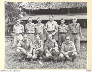 LAE, NEW GUINEA. 1944-08-19. CLERKS OF A BRANCH, HEADQUARTERS, NEW GUINEA FORCE OUTSIDE THEIR OFFICE. IDENTIFIED PERSONNEL ARE:- NX154874 PRIVATE K.R. BENSON (1); NX155799 PRIVATE F.J. QUINN (2); ..