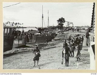 MADANG, NEW GUINEA. 1944-05-18. A SECTION OF THE WATERFRONT SHOWING TRANSFORMED ACTIVITY 3 WEEKS AFTER ALLIED OCCUPATION