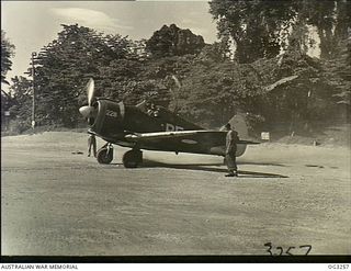 TOROKINA, BOUGAINVILLE ISLAND, SOLOMON ISLANDS. C. 1945-08. TAXIING OUT BEFORE TAKING OFF FROM A BOUGAINVILLE JUNGLE STRIP ON A TACTICAL RECONNAISSANCE SORTIE, 432800 FLYING OFFICER DOUG HILLIGER, ..