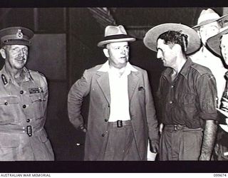 LAE, NEW GUINEA, 1946-01-27. THE HONOURABLE F. M. FORDE, MINISTER FOR THE ARMY, (2) WITH LIEUTENANT-GENERAL H. C. H. ROBERTSON, GENERAL OFFICER COMMANDING FIRST ARMY, (1), AFTER HIS BROADCAST FROM ..