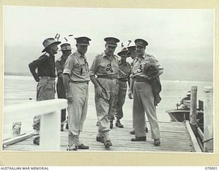 MALMAL VILLAGE, NEW BRITAIN. 1945-02-09. VISITING AUSTRALIAN GENERALS ON THE WHARF AT HEADQUARTERS, 5TH DIVISION. IDENTIFIED PERSONNEL ARE:- VX27 MAJOR-GENERAL A.H. RAMSAY, CBE, DSO, ED, GENERAL ..