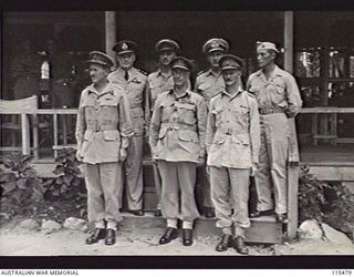 TOROKINA, BOUGAINVILLE. 1945-09-08. LIEUTENANT-GENERAL S. G. SAVIGE, GENERAL OFFICER COMMANDING 2 CORPS, AND THE SENIOR ALLIED OFFICERS WHO TOOK PART IN THE SURRENDER OF JAPANESE FORCES IN THE AREA