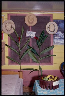 Room interior with tanoa fai'ava filled with fruit