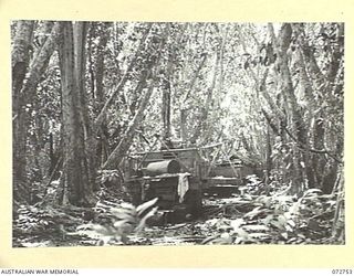 MADANG, NEW GUINEA. 1944-04-26. JAPANESE TRUCKS, ABANDONED IN A RUBBER PLANTATION AT BOGADJIM, WHICH WERE CAPTURED DURING THE ADVANCE OF THE 57/60TH INFANTRY BATTALION