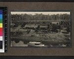 View of shoreline with houses and boat, Mailu, Papua New Guinea, ca. 1905
