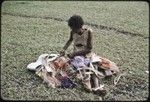 Weaving: woman makes colorful skirt from banana fibers