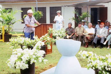 Mr. Lee Edwards, president of the Fifth Marine Field Depot Association addresses the audience during the 50th anniversary ceremony of the Liberation of Guam during World War II