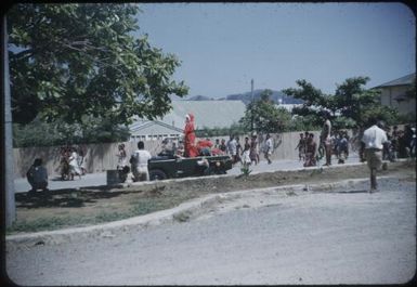 What they were looking at (Father Christmas standing up in a land-rover!) : Port Moresby, Papua New Guinea, 1953 / Terence and Margaret Spencer
