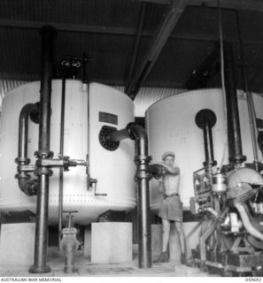 DONADABU AREA, NEW GUINEA. 1943-11-08. FILTER TANKS IN THE LALOKI RIVER PUMPING STATION WHICH IS SITUATED ABOUT A MILE UPSTREAM FROM THE BOMANA PUMPING STATION AND SUPPLIES 300,000 GALLONS PER DAY ..