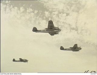 WEWAK AREA, NORTH EAST NEW GUINEA. C. 1944-10. AIRCRAFT OF NO. 8 (BEAUFORT) SQUADRON RAAF, CODE NAME UV-E, UV-S, UV-W, WING THEIR WAY HOME AFTER DROPPING BOMBS ON AN ENEMY TARGET NEAR WEWAK