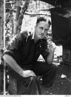 KILIGIA, NEW GUINEA. 1944-03-20. INFORMAL PORTRAIT OF VX72048 SERGEANT F. MCKECHNIE, CINEMATOGRAPHIC PHOTOGRAPHER, AUSTRALIAN MILITARY HISTORY SECTION