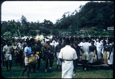 Sing-sing on Boxing Day at the Old Football Oval, Lae, between 1955 and 1960, [9] Tom Meigan