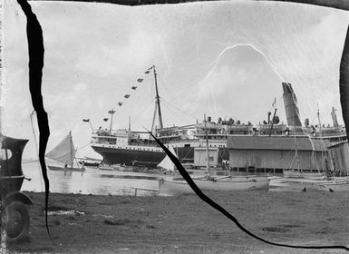 [A steamship at port]