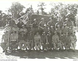 LAE, AREA, NEW GUINEA. 1944-11-18. PERSONNEL OF NO.2 PLATOON, GENERAL ENGINEERING COMPANY, 2/7TH ADVANCED WORKSHOPS, COMPANY COMMANDER NX200523 LIEUTENANT R.A. RODGERS, PLATOON SERGEANT, NX23195 ..