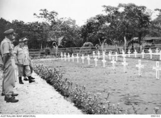 AITAPE, NEW GUINEA, 1945-03-20. GENERAL SIR THOMAS A. BLAMEY, COMMANDER IN CHIEF, ALLIED LAND FORCES, SOUTH WEST PACIFIC AREA (SECOND FROM LEFT), WITH CAPTAIN R. J. KERR, OFFICER COMMANDING 7TH WAR ..