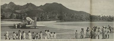 The arrival of Dakotas on the airstrip at Rarotonga is a never-ending source of interest to the inhabitants