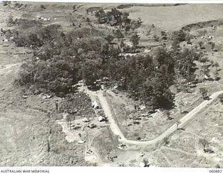 DUMPU AREA, RAMU VALLEY, NEW GUINEA. 1943-11-27. AERIAL VIEW OF THE CAMP AREA OF HEADQUARTERS, 7TH AUSTRALIAN DIVISION