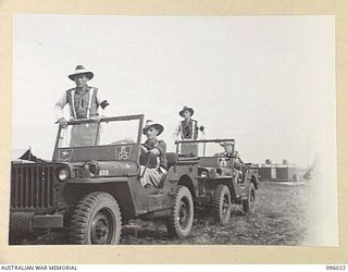 CAPE WOM, WEWAK AREA, NEW GUINEA. 1945-09-05. THE JEEP ESCORT SECTION, 6 DIVISION PROVOST COMPANY. THESE ARE USED FOR ESCORTING THE GENERAL OFFICER COMMANDING AND HIGH PERSONAGES THAT MAY VISIT THE ..
