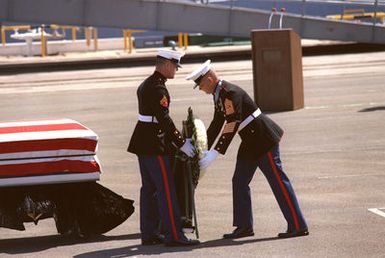 Sergeant Major Alan Kellogg Jr., a Medal of Honor recipient for service in Vietnam, places a wreath at the base of the casket of the Unknown Serviceman of the Vietnam Era during the designation and departure ceremony. The frigate USS BREWTON (FF 1086) will transport the Unknown to Naval Air Station Alameda, California. He will be taken to Travis Air Force Base for the flight to Washington, District of Columbia