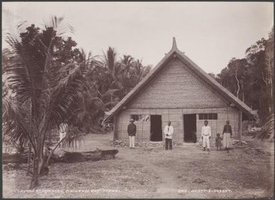Five adults and a child outside the church at Mindoru, Ysabel, Solomon Islands, 1906 / J.W. Beattie