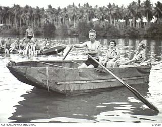 MADANG, NEW GUINEA. 1944-08-25. QX5294 CAPTAIN R. HAMILTON, QUARTERMASTER, 2/11TH GENERAL HOSPITAL (1) TAKING TWO NURSING SISTERS OF HIS UNIT FOR A ROW IN A CAPTURED JAPANESE BOAT. THEY ARE:- ..
