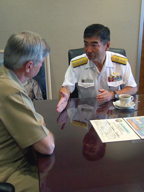 Japanese (JPN) Rear Admiral (RDML) Yukinori Togo, (right), Commander Japanese Maritime Self Defense Force (JMSDF) Training Squadron, meets with US Navy (USN) Vice Admiral (VADM) Mike McCabe, Commander Third Fleet, to thank him for supporting his transit from Pearl Harbor to San Diego. The support included underway replenishments (UNREPS) and passing exercises (PASSEX) between three Japanese ships in RDML Togos training squadron and American ships