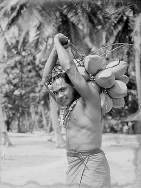 [Man carrying fruit]