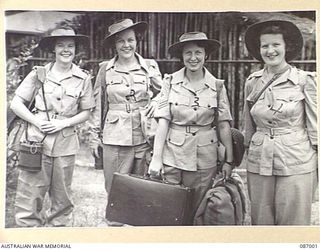 BRISBANE, QLD. 1945-02-21. AUSTRALIAN ARMY MEDICAL WOMEN'S SERVICE REINFORCEMENTS AT FRAZER'S PADDOCK BEFORE THEIR EMBARKATION TO THE 2/1 GENERAL HOSPITAL AT BOUGAINVILLE. IDENTIFIED PERSONNEL ..