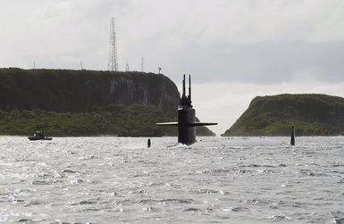 050109-N-7293M-001 (Jan. 9, 2005)US Navy (USN) Los Angeles Class Attack Submarine USS SAN FRANCISCO (SSN 711) passes the Orote cliff line as it enters her home port of Naval Base Guam following an incident in which it ran aground approximately 350 miles south of the US territory on Jan. 8.U.S. Navy photo by Photographer's Mate Second Class Nathanael T. Miller (RELEASED)