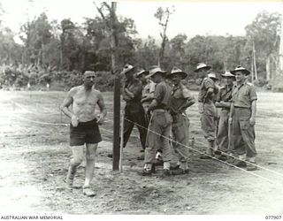 TOROKINA, BOUGAINVILLE ISLAND. 1945-01-01. VX111 LIEUTENANT-COLONEL N.L. GOBLE, HEADQUARTERS, 29TH INFANTRY BRIGADE WINNING THE MILE WALK EVENT AT THE ATHLETIC MEETING ORGANISED BY HEADQUARTERS, ..