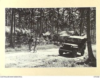 MILNE BAY, NEW GUINEA, 1944-02-10. THE CONVALESCENT DEPOT MAINTAINED BY "A" COMPANY, 8TH FIELD AMBULANCE. THE SITE, FORMERLY A CASUALTY CLEARING STATION, IS IN A PORTION OF THE WAIGANI PLANTATION ..