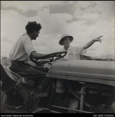 Famer on tractor with Field Officer
