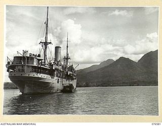 HOSKINS, NEW BRITAIN. 1944-10-10. THE DUTCH TROOPSHIP "SWEARTENHONDT" AT ANCHOR IN THE BAY, MOUNT MULULUS 4282 FEET CAN BE SEEN IN THE BACKGROUND