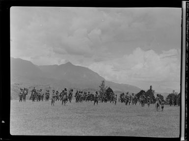 Group of locals looking at an Aeroplane, Kerowagi, Papua New Guinea