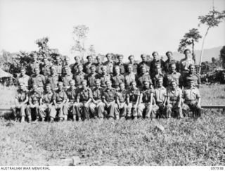 Torokina, Bougainville. 1945-10-12. Group portrait of the members of Headquarters 6th Battery, 2/11th Field Regiment. This unit performed valuable work in the Bougainville campaign with 25 pounder ..