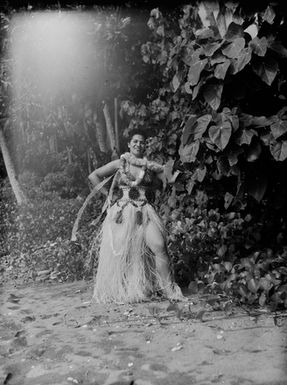 [Portrait of a woman standing on the shoreline]