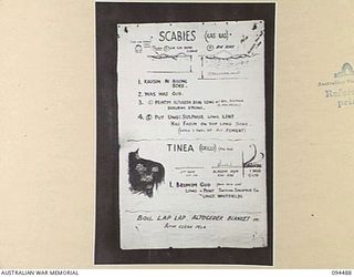 LAE AREA, NEW GUINEA, 1945-08-03. A "PIDGIN" ENGLISH CHART USED FOR THE INSTRUCTION OF NATIVE REGIMENTAL AID POST ORDERLIES. THE PHOTOGRAPH WAS MADE AT THE REQUEST OF HEADQUARTERS AUSTRALIAN NEW ..