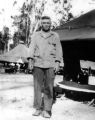 Jack Wolf in front of tents in Pacific Theater, 1940s