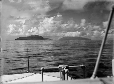 [View of two islands and sea from on board a ship]