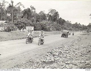 LAE, NEW GUINEA. 1944-09-21. MEMBERS OF THE NEW GUINEA FORCE PROVOST COMPANY ON ESCORT DUTY. IDENTIFIED PERSONNEL ARE:- SERGEANT A.J. DENSMORE (1); CORPORAL L.J. LEYS (2); CORPORAL A.E. MUSTON (3); ..