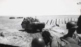 Amphibious army vehicle carrying soldiers to Guadalcanal, 1940s